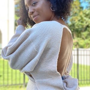 New with tags: Rich knit backless sweater that ties at lower back/waist.